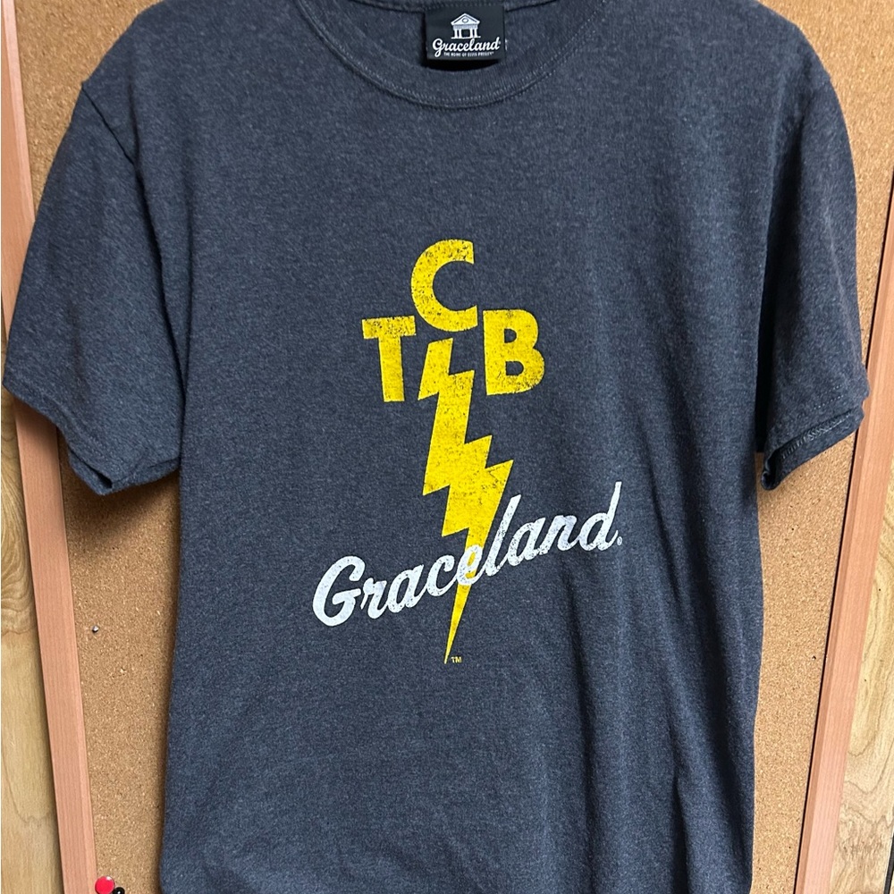 Vintage Elvis Presley's TCB T-shirt in Graceland